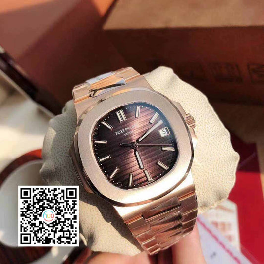 Patek Philippe Nautilus 5711/1R-001 –Wrapped 18k Rose Gold light red dial