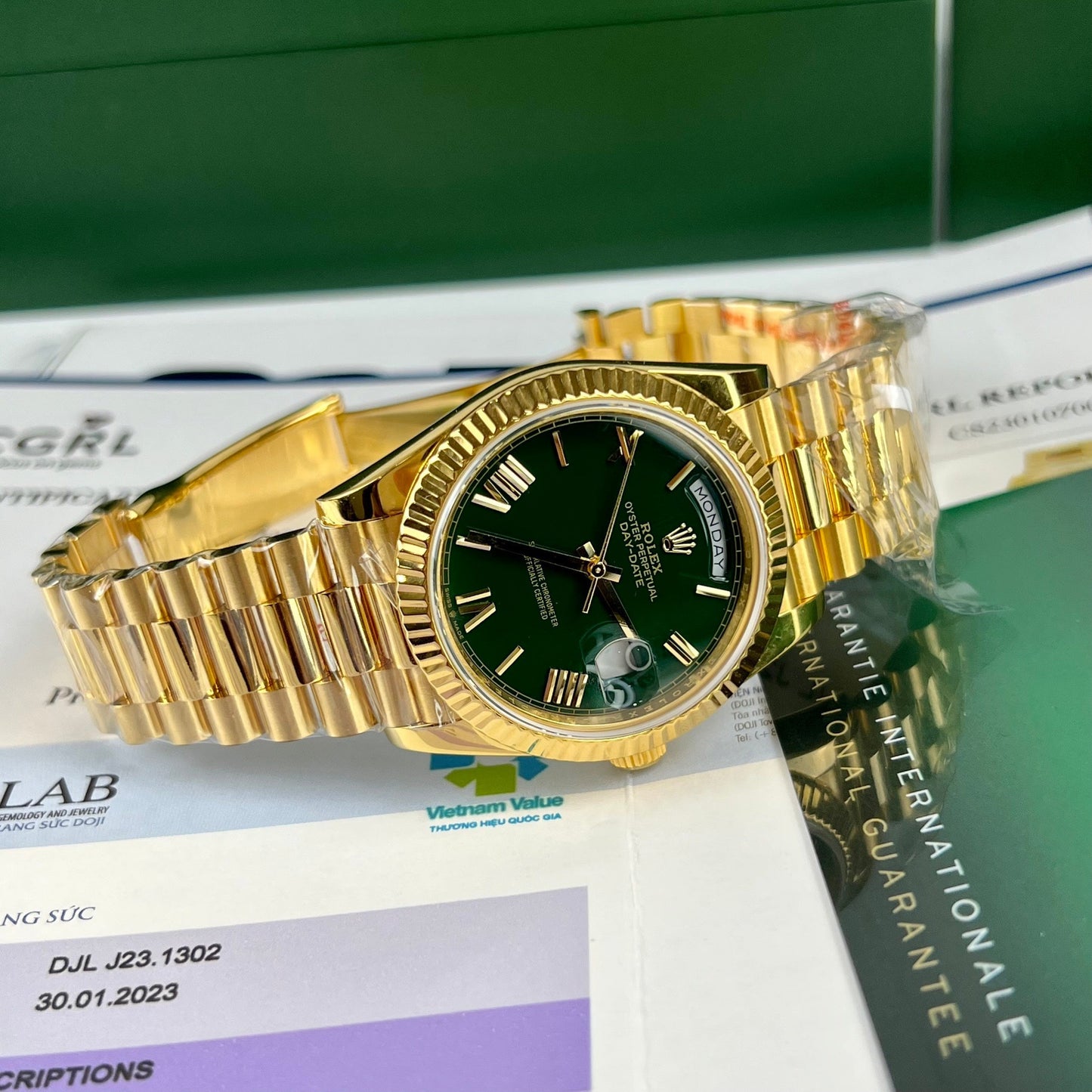 Rolex DayDate 40 mm 228238 recubierto de oro amarillo de 18 k Esfera verde presidente 130 gramos